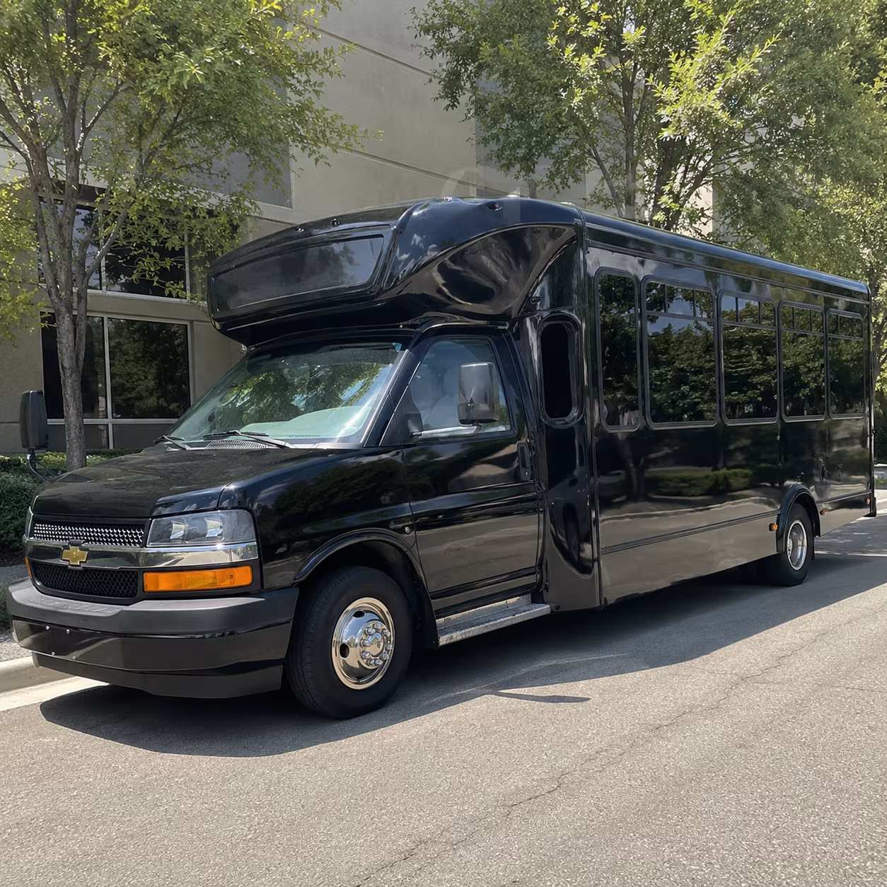 Group beside a Mercedes Sprinter limo in Oakland